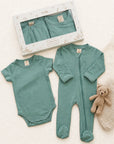A 5-piece baby sleepwear set in a dusty sage green color