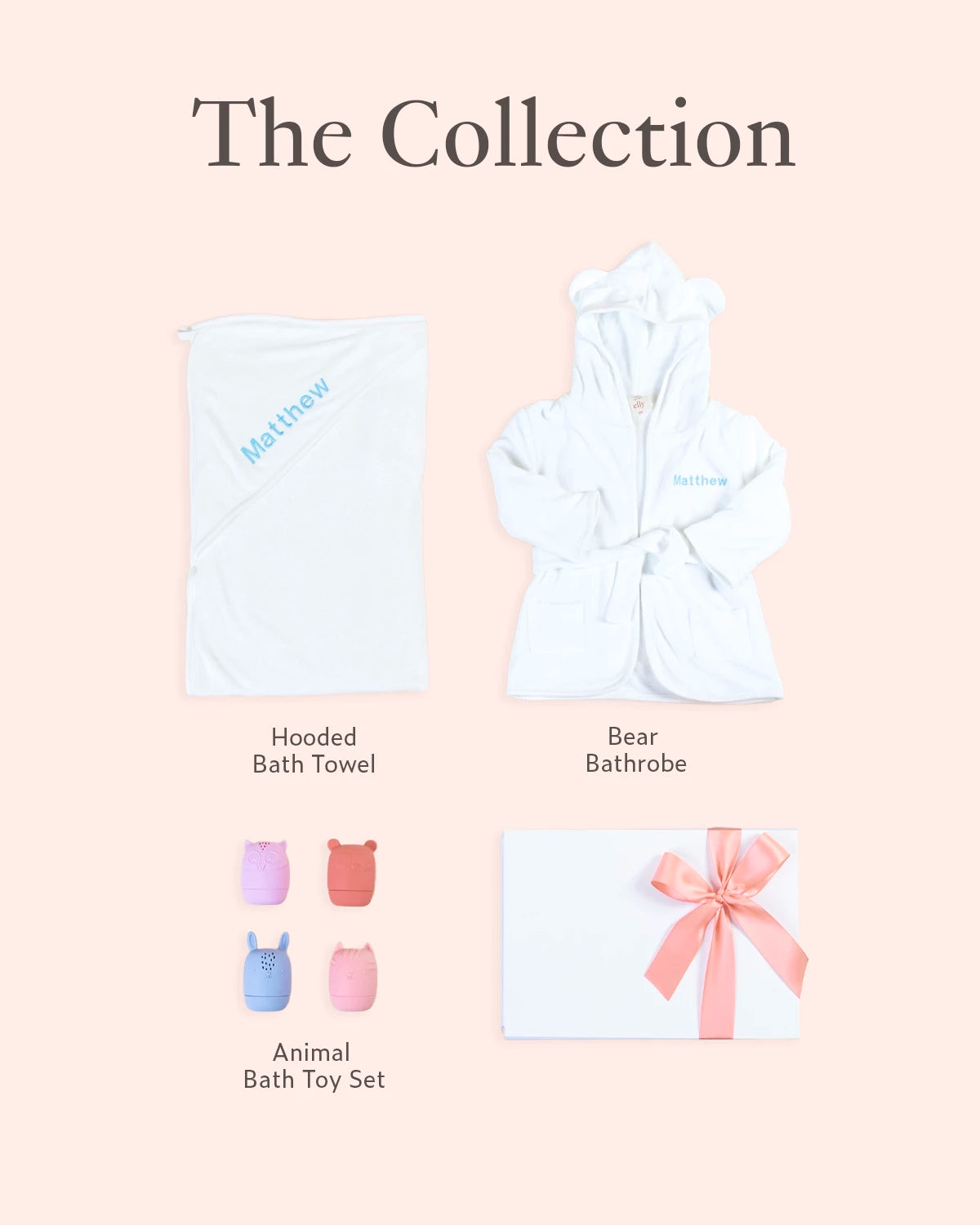Flatlay of personalised baby gift set with towel, animal toys, gift box, and ribbon packaging