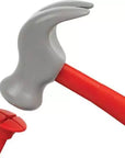 A close-up of a red-handled claw hammer with a gray metal claw head, shown alongside a red nail or nail head on a plain white background.