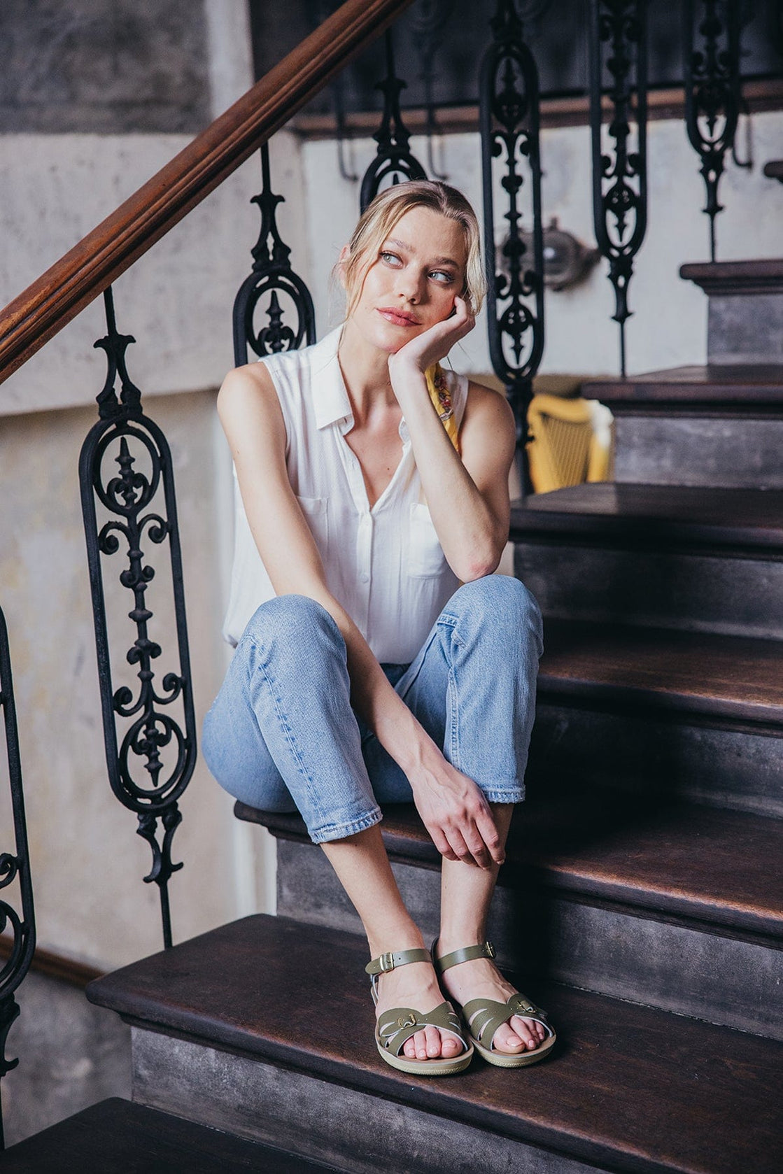 Ksenia at Olive Boardwalk cafe, sitting on stairs