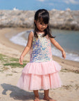Young girl in sequin dress on beach - DSC07561