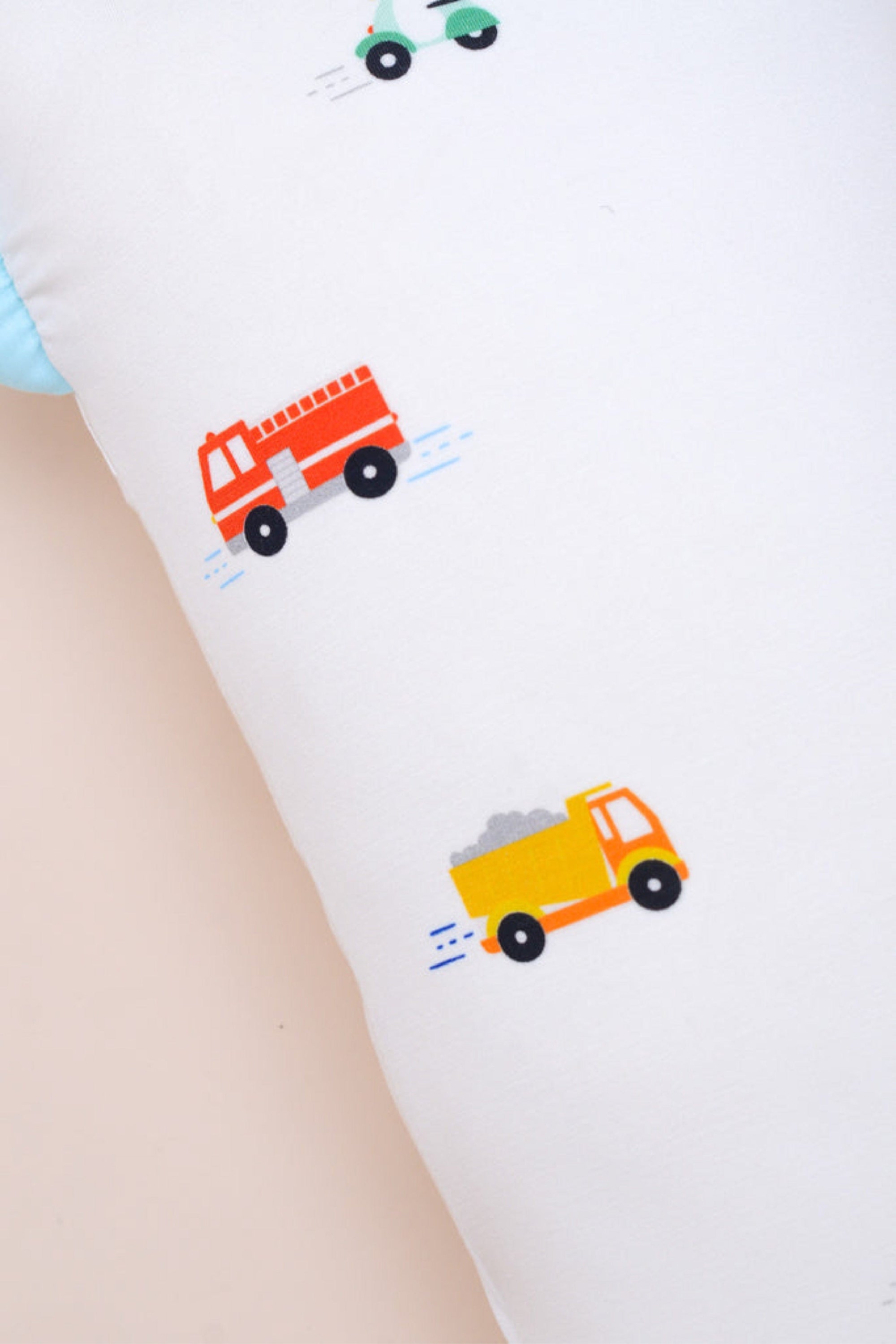 Close up of pillow with vehicle print