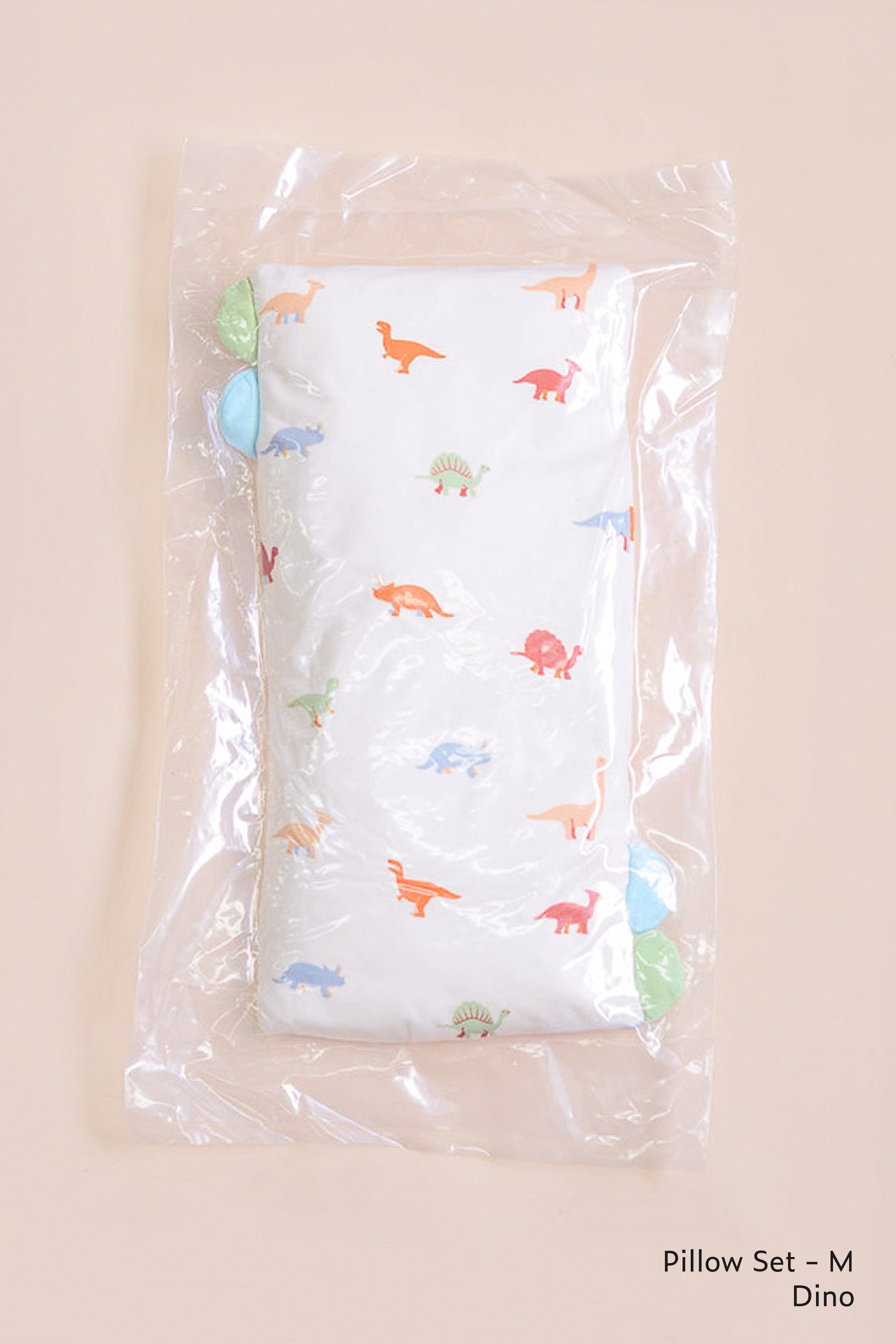 Dino pillow set M in clear packaging