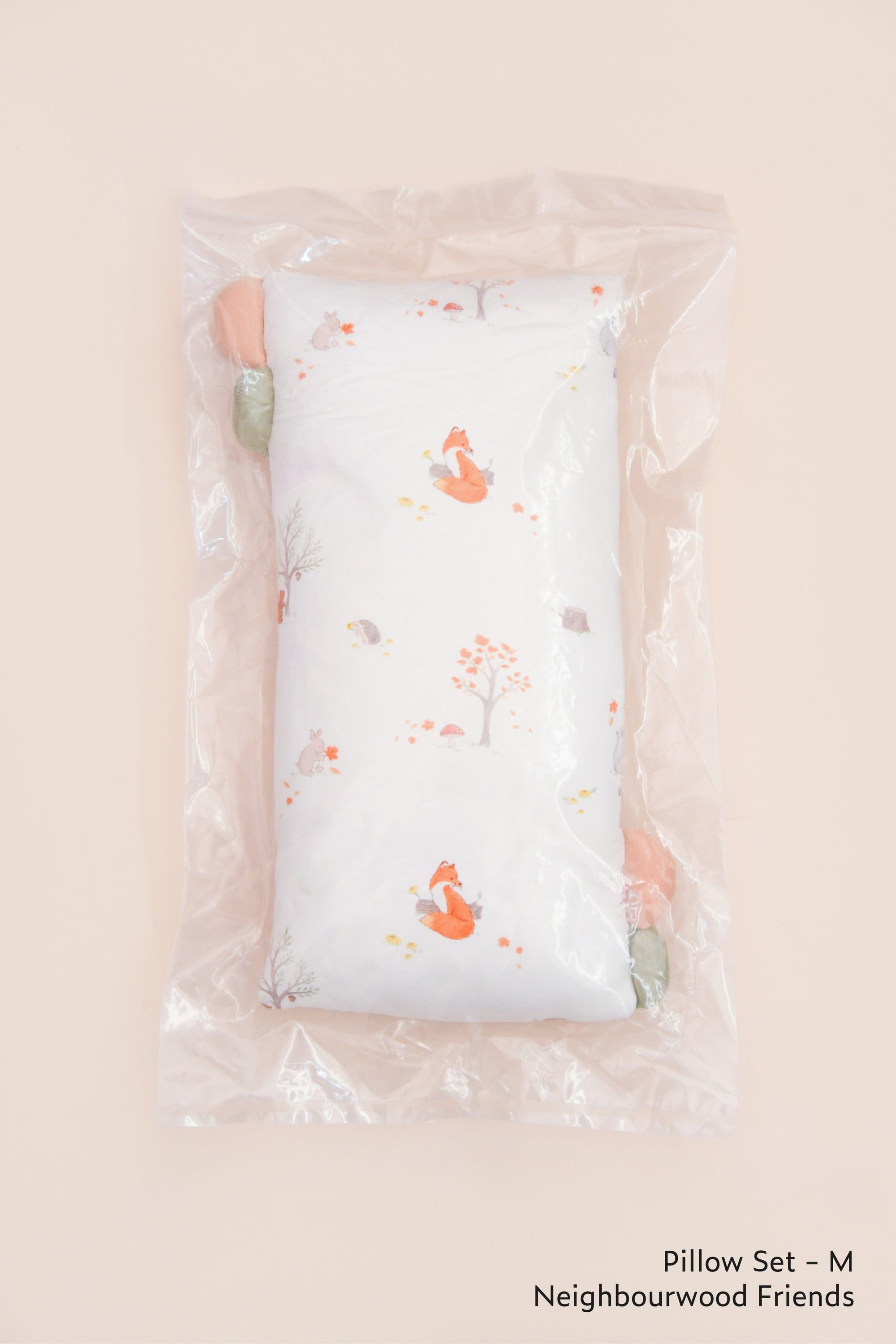 Neighbourwood Friends pillow set in packaging.
