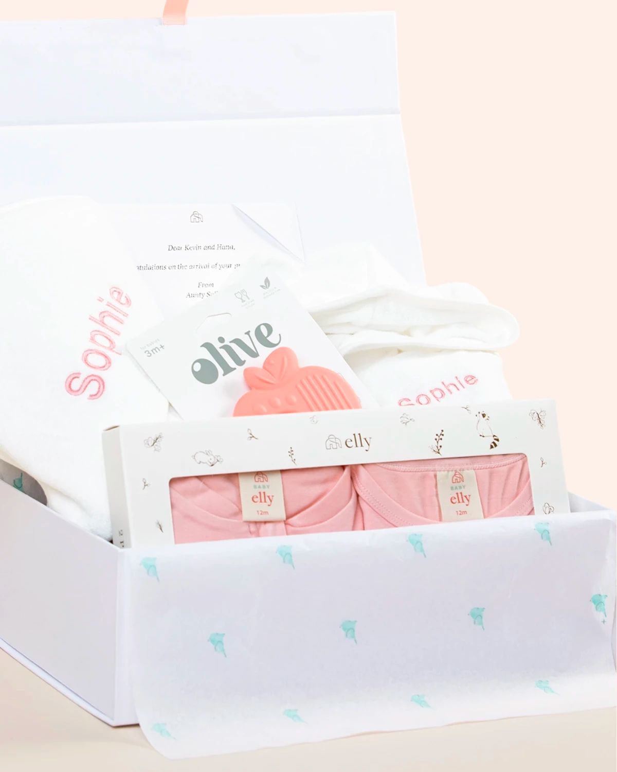 Open Sweet Dreams Baby Gift Set showing personalised baby essentials and silicone teether inside gift box