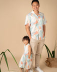 Father and daughter in matching pastel outfits, GreenLandscape_3