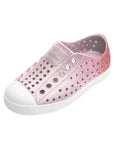 Angled view of pink gradient casual slip-on shoes with perforated upper and rounded toe