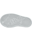 Denim blue rubber outsole with textured grip pattern and anti-slip traction design