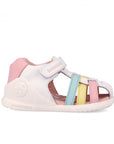 White sandal with pink, blue, and yellow accents on a white background