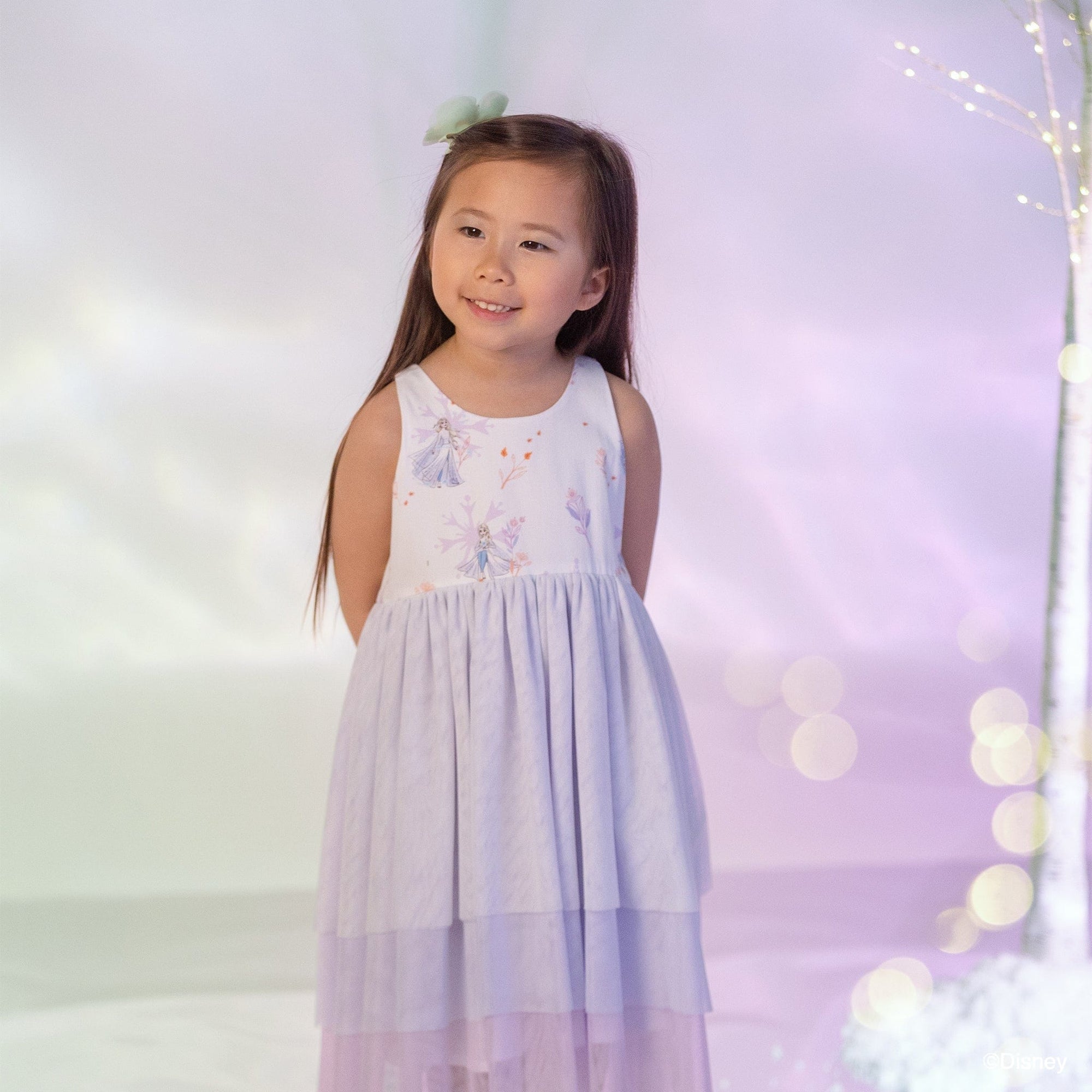 Little girl in Frozen dress, product image.
