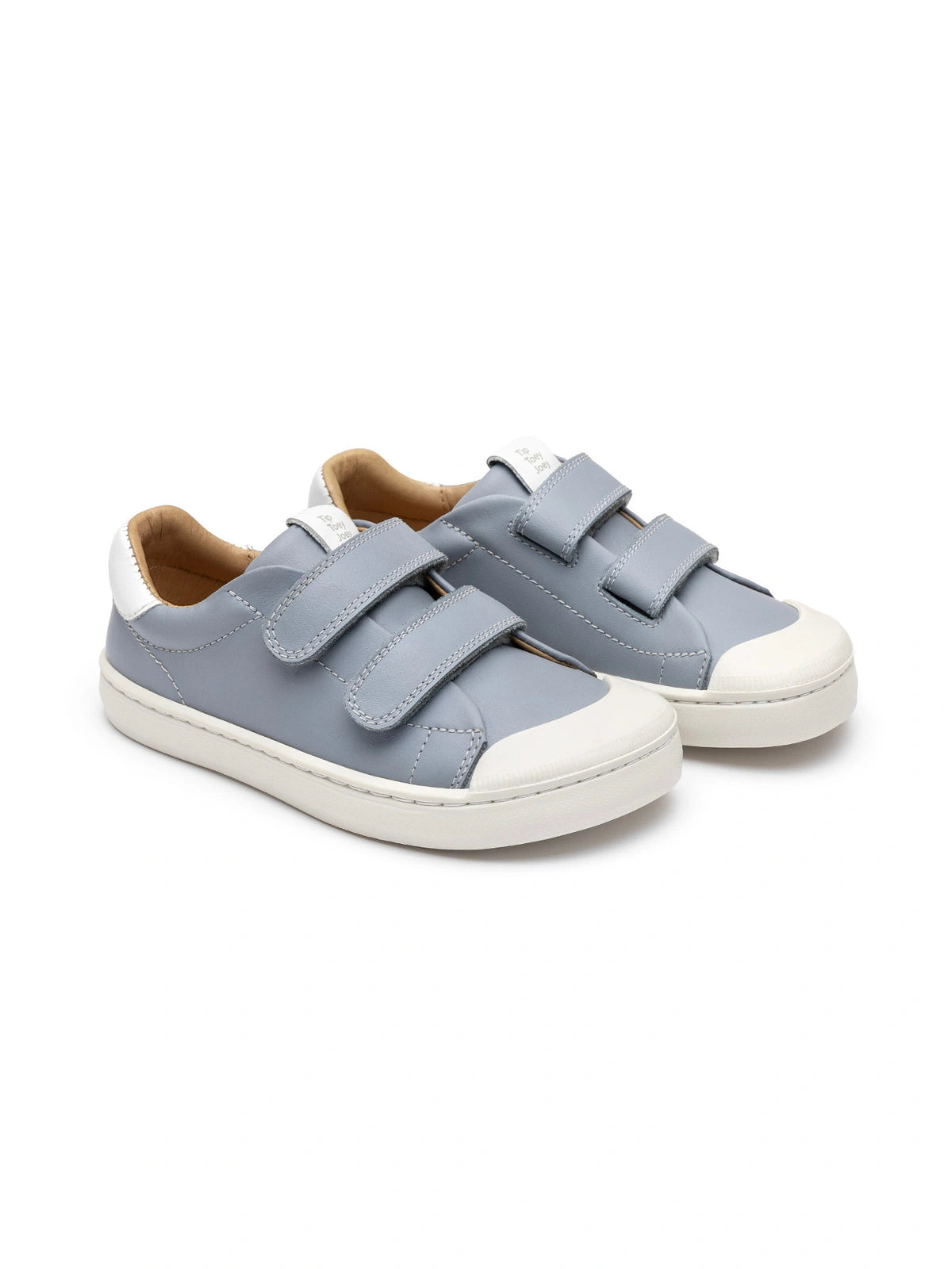 A pair of Ramp Sneakers for kids in Tide Blue leather with white rubber toe caps and double straps.