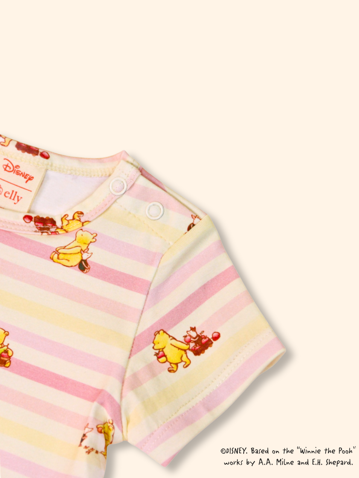Classic Pooh baby onesie in pink with harvest print, soft cotton fabric