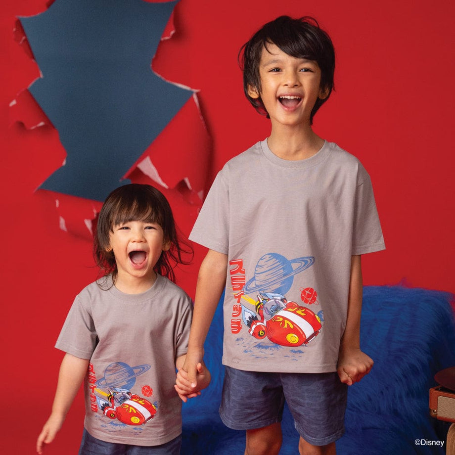 Kids in Stitch space-themed shirts