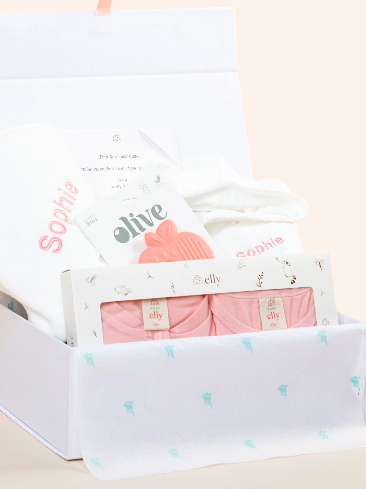 Open Sweet Dreams Baby Gift Set showing personalised baby essentials and silicone teether inside gift box