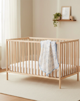 Bamboo Muslin Blanket - Beary Best on a cot