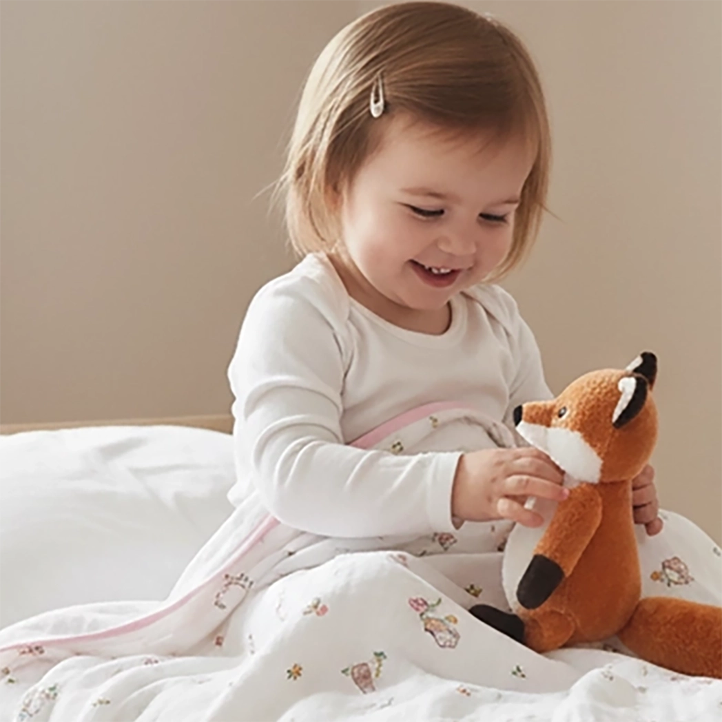 child wrapped with our bamboo blanket