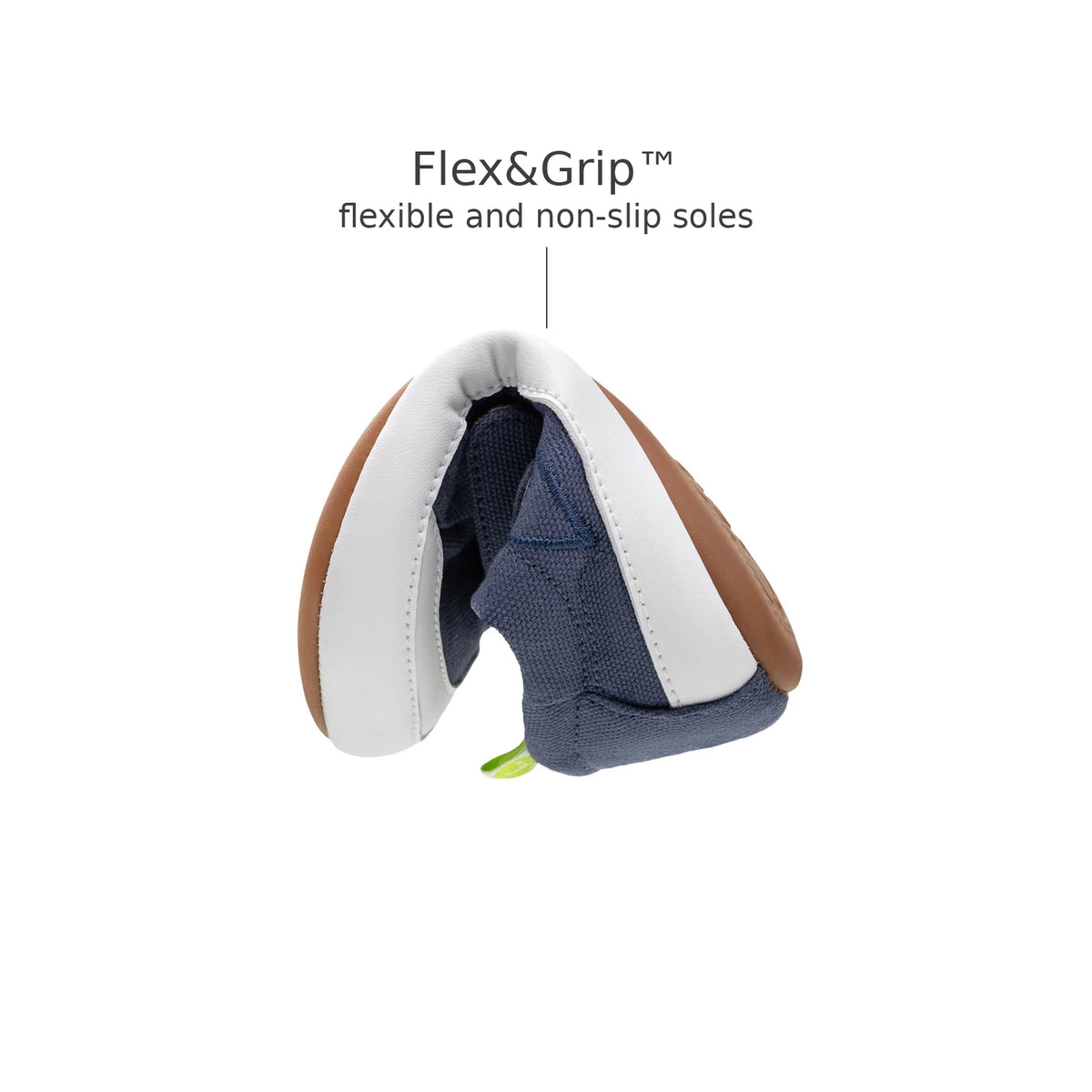 Bossy Green baby sneaker in Lona Azul Klein bending at the toe to show its flexible sole