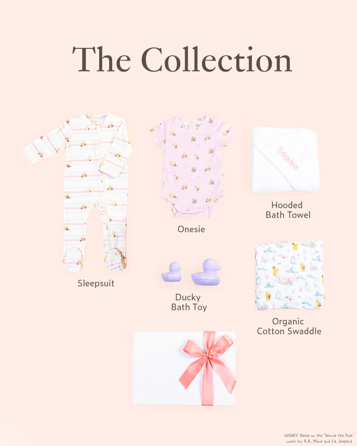 Baby product collection including a sleepsuit, onesie, hooded bath towel, ducky bath toy, and organic cotton swaddle. 