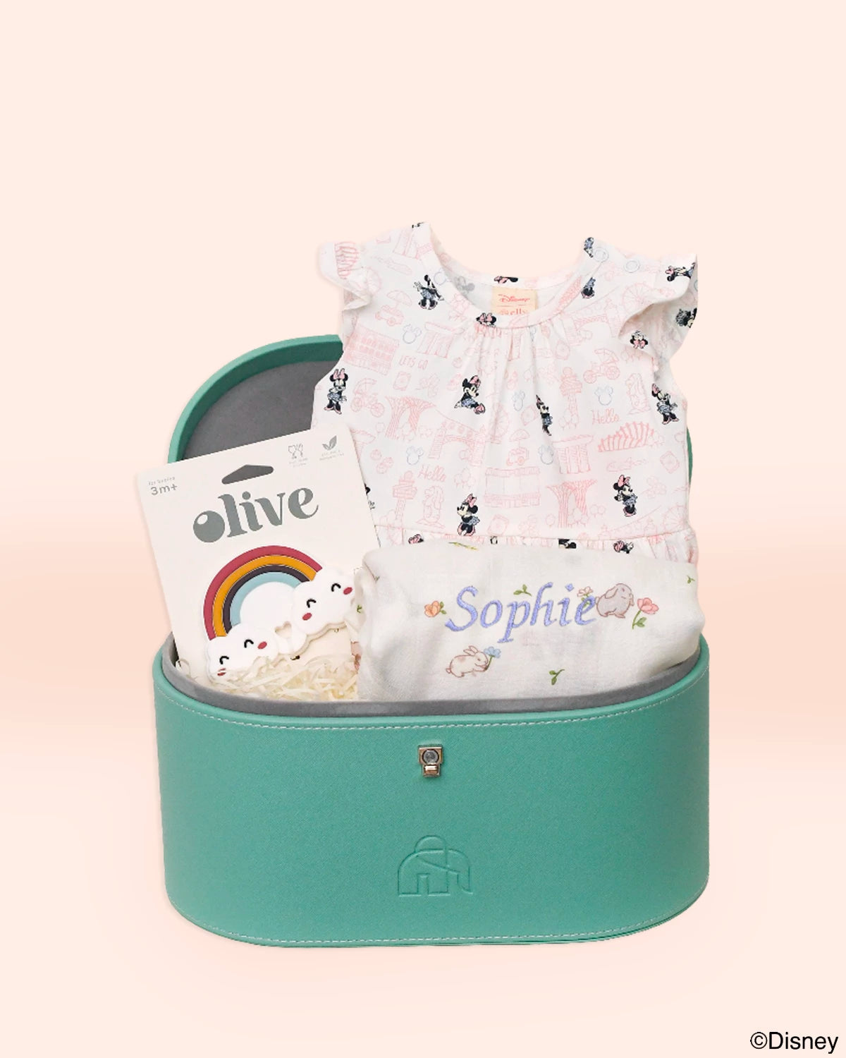 gift set includes olive toy, kate onesie in pink hello minnie and bamboo muslin swaddle 