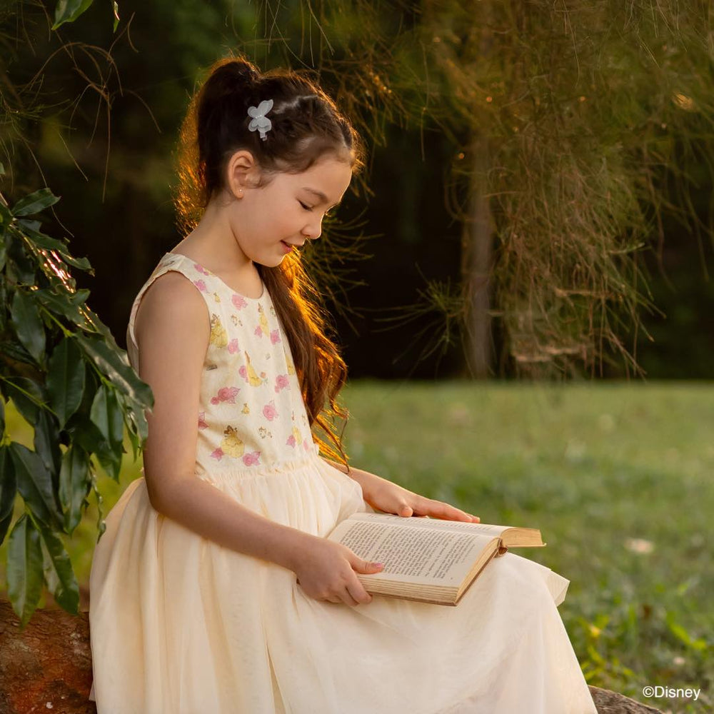 Disney princess gallery - girl reading book in garden