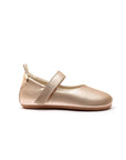 Side profile of the Dolly Mary Jane in metallic salmon, showing the slim rubber sole and ergonomic baby shoe shape.