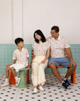 Matching family set in Childhood Games print by Elly featuring dad, mom, and son.