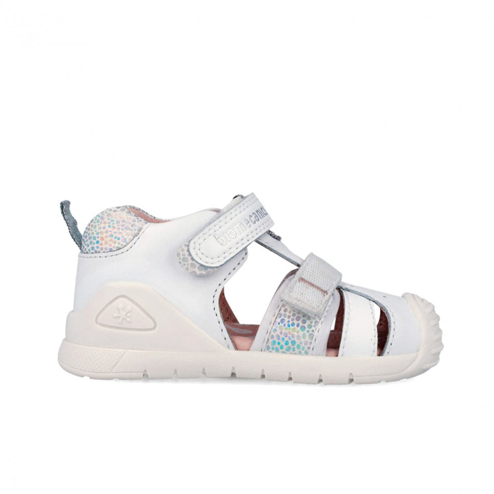 White sandal with colorful accents on a white background