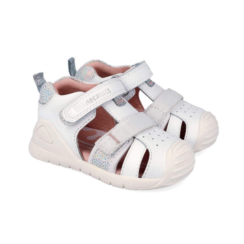 White children's sandals with gray straps on a white background