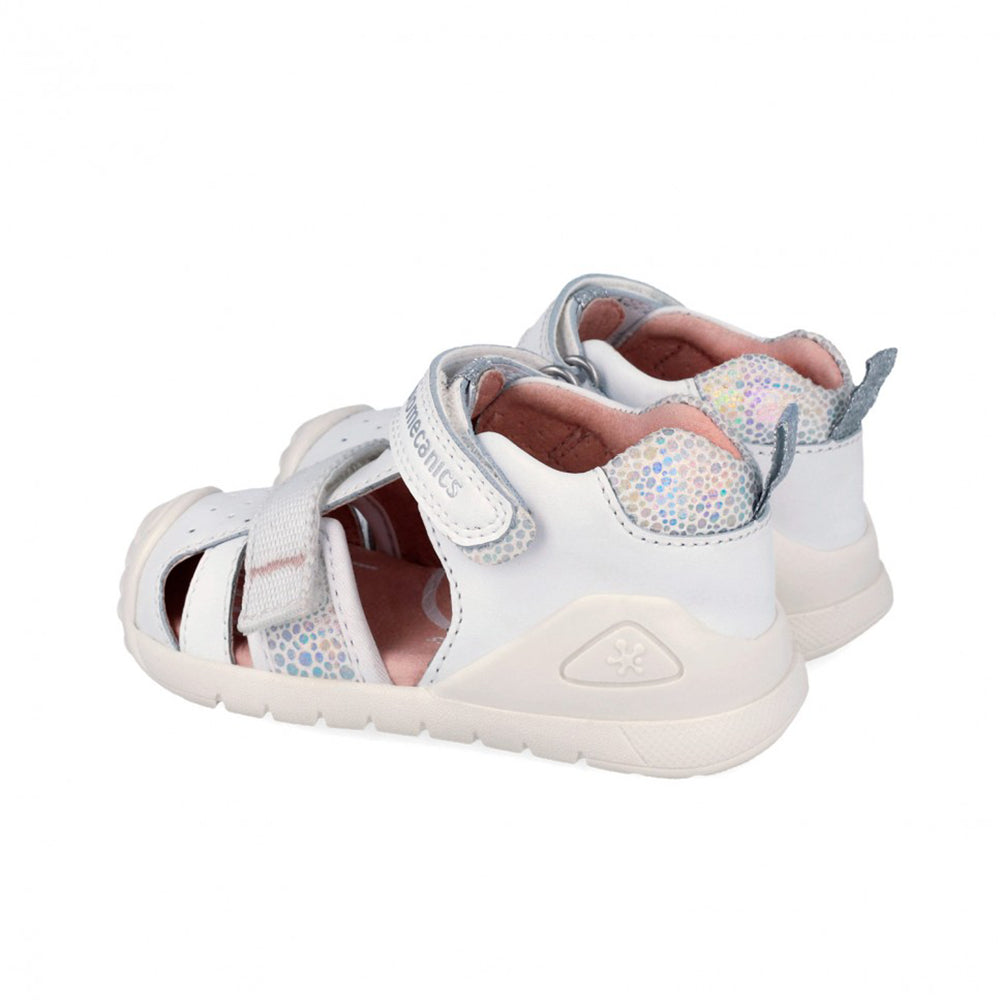 Pair of children's sandals with colorful sole on a white background