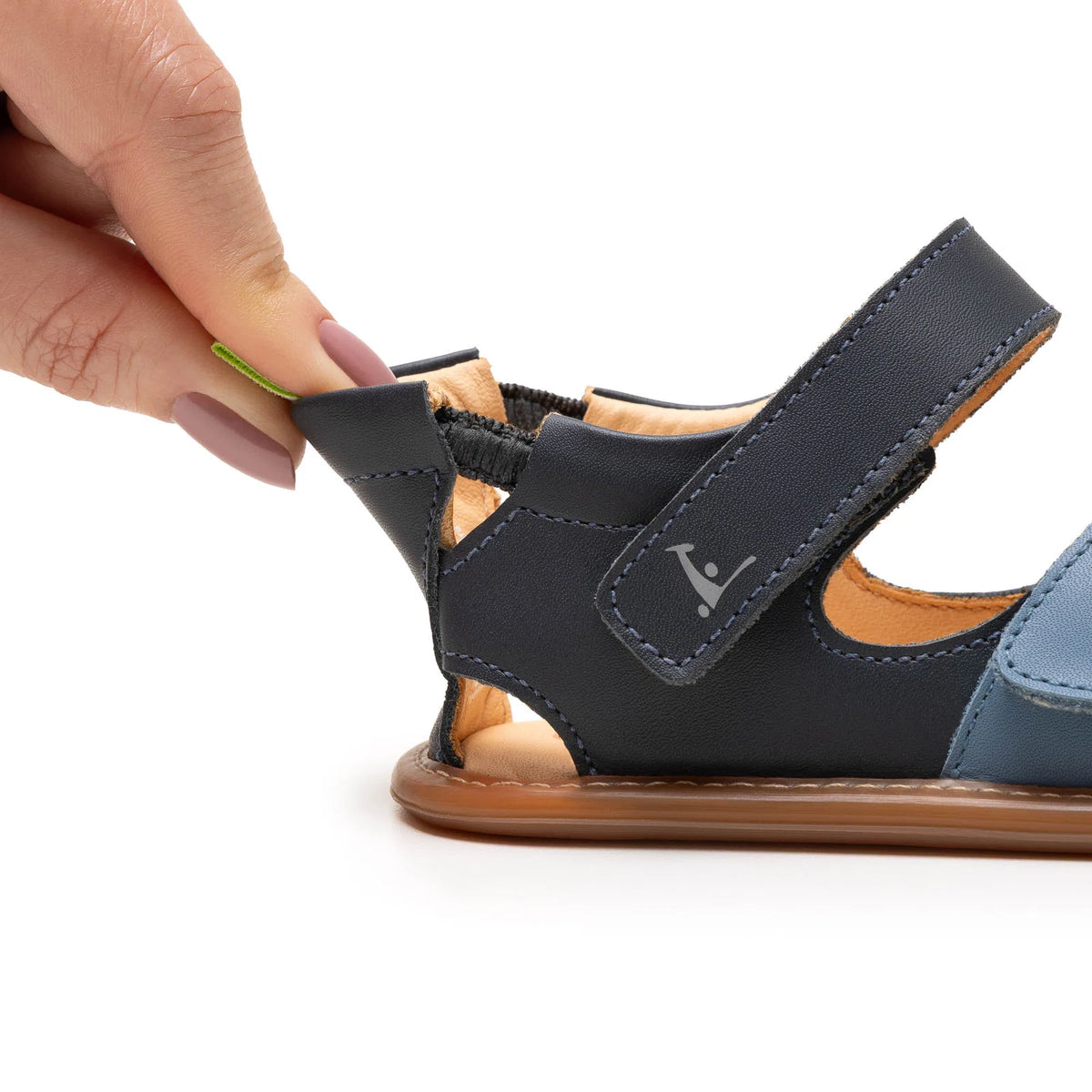 Side view of Tip Toey Joey Flipper Sandals in Denim / Blue Tang / Navy