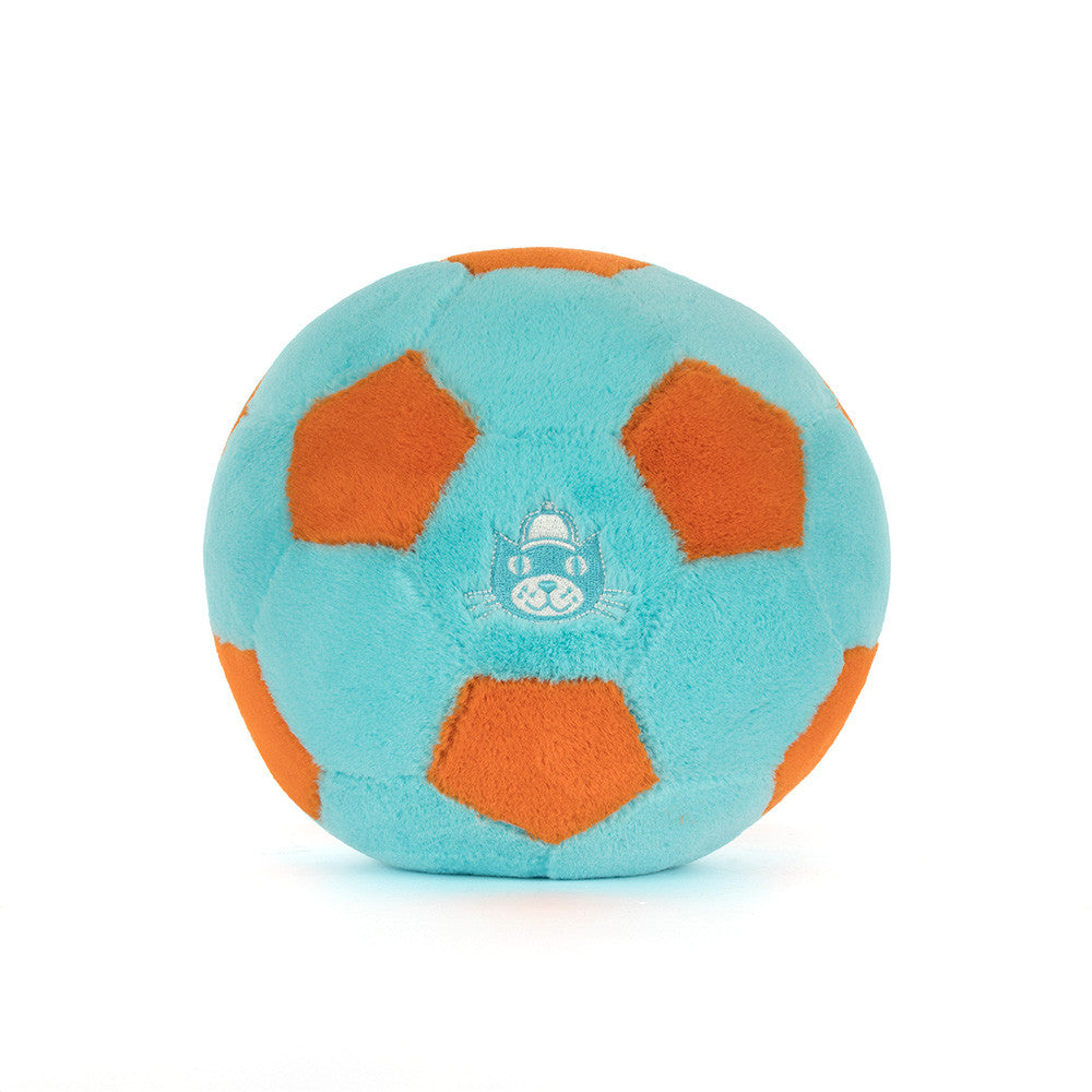 Plush toy  soccer ball with orange panels on a white background