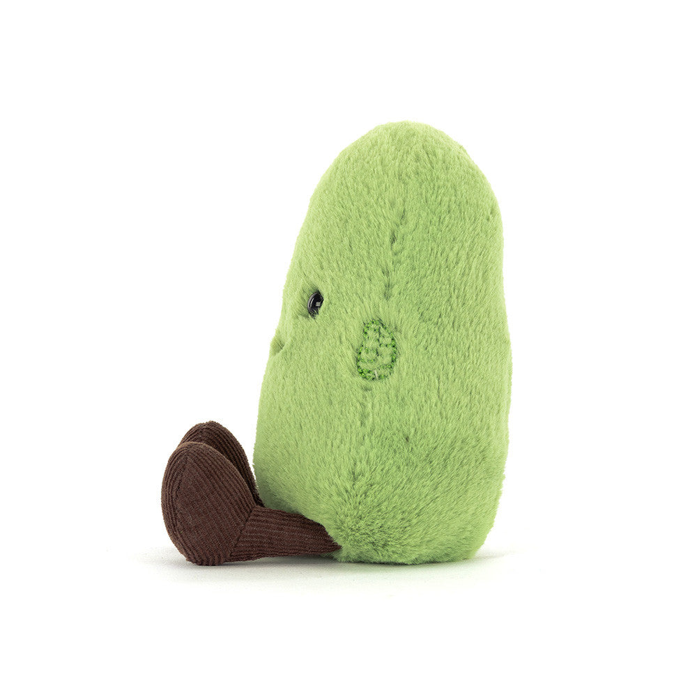 Plush green bean toy on a white background