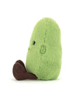 Plush green bean toy on a white background