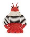 Plush toy lobster wearing a striped shirt  on a white background