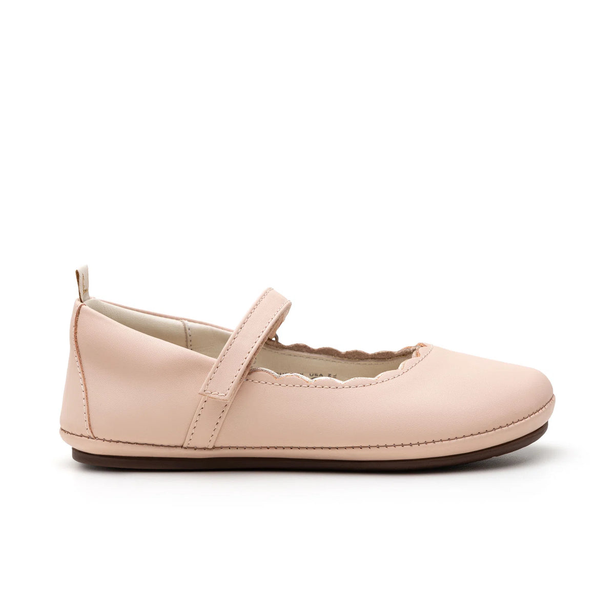 Tip Toey Joey Misty in Papaya Cream / Metallic Salmon bending at the toe to show the flexible sole