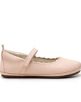Tip Toey Joey Misty in Papaya Cream / Metallic Salmon bending at the toe to show the flexible sole