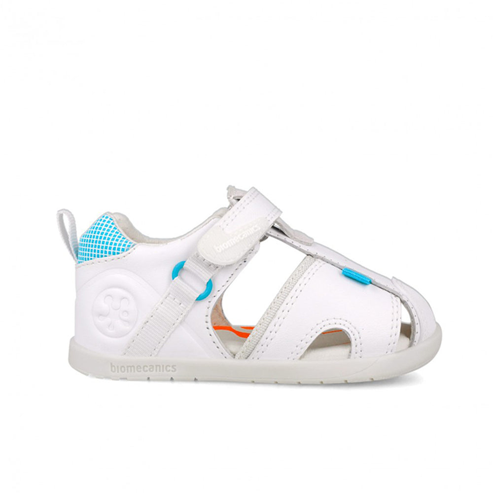 White sandal with blue accents on a white background