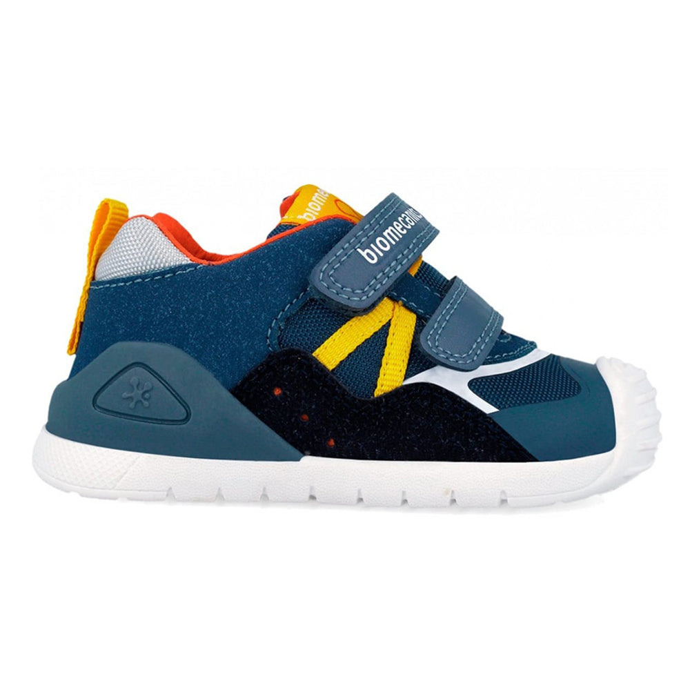 Blue children's sneakers with orange and yellow accents on a white background