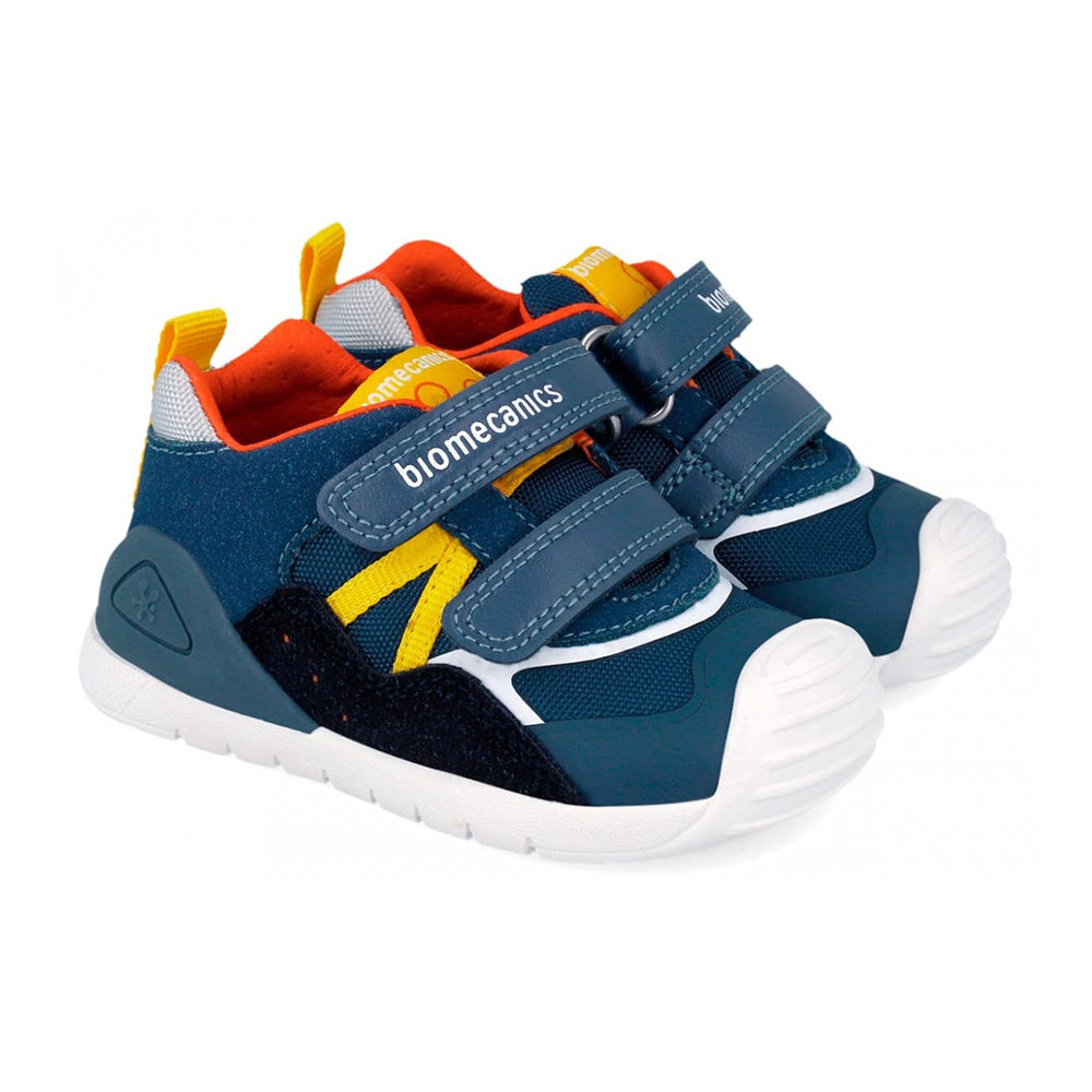 Children's sneakers with blue, orange, and yellow accents on a white background