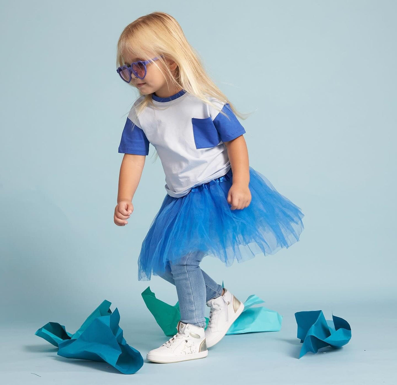 Girl in blue tutu and sneakers, Old Soles gallery 1