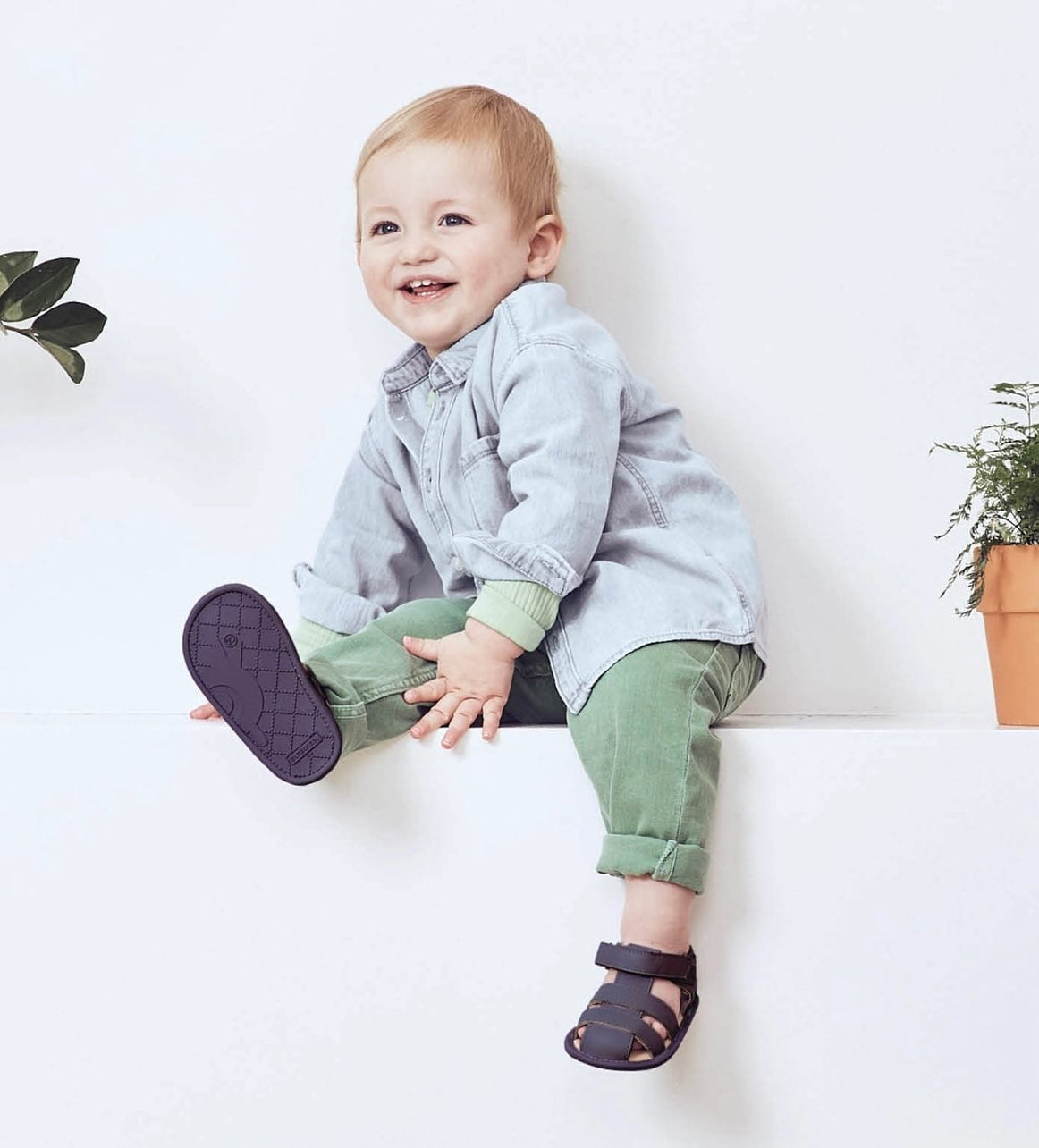 smiling baby in sandals