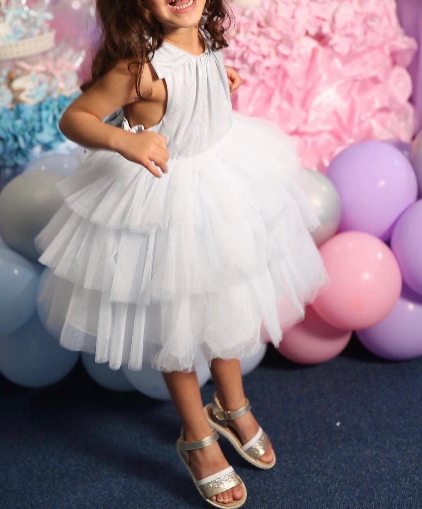Girl in white dress with sandals