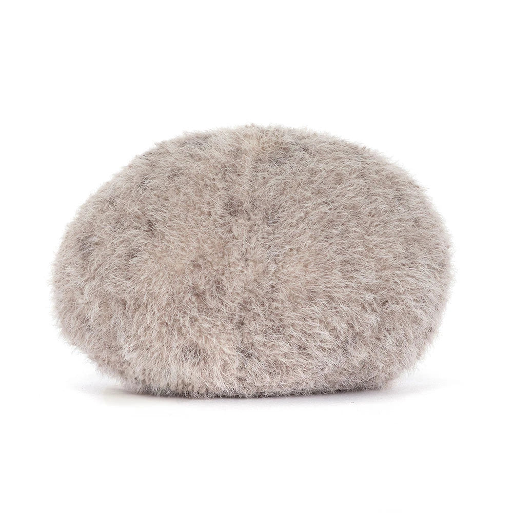Round, fluffy gray pebble toy