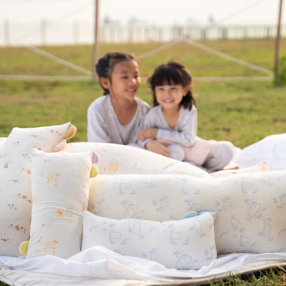 Kids with pillows in gallery
