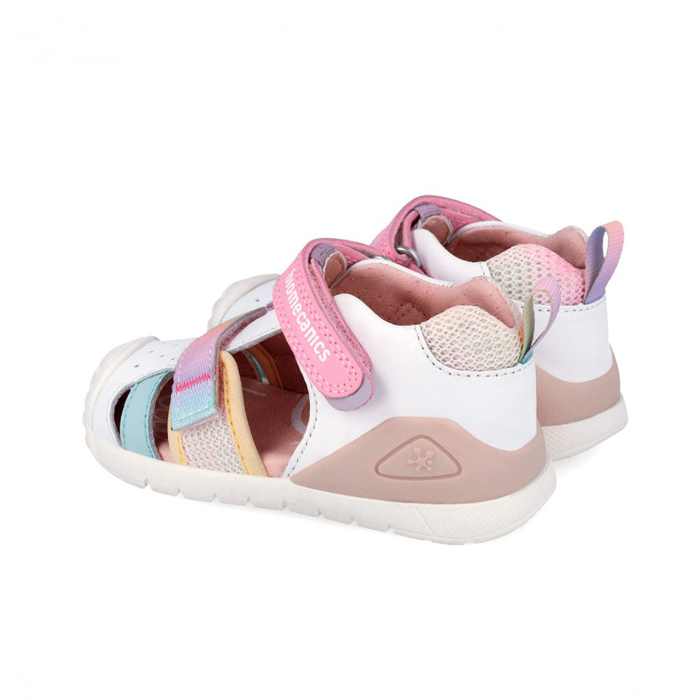 Pair of children's sandals with pink and white straps on a white background