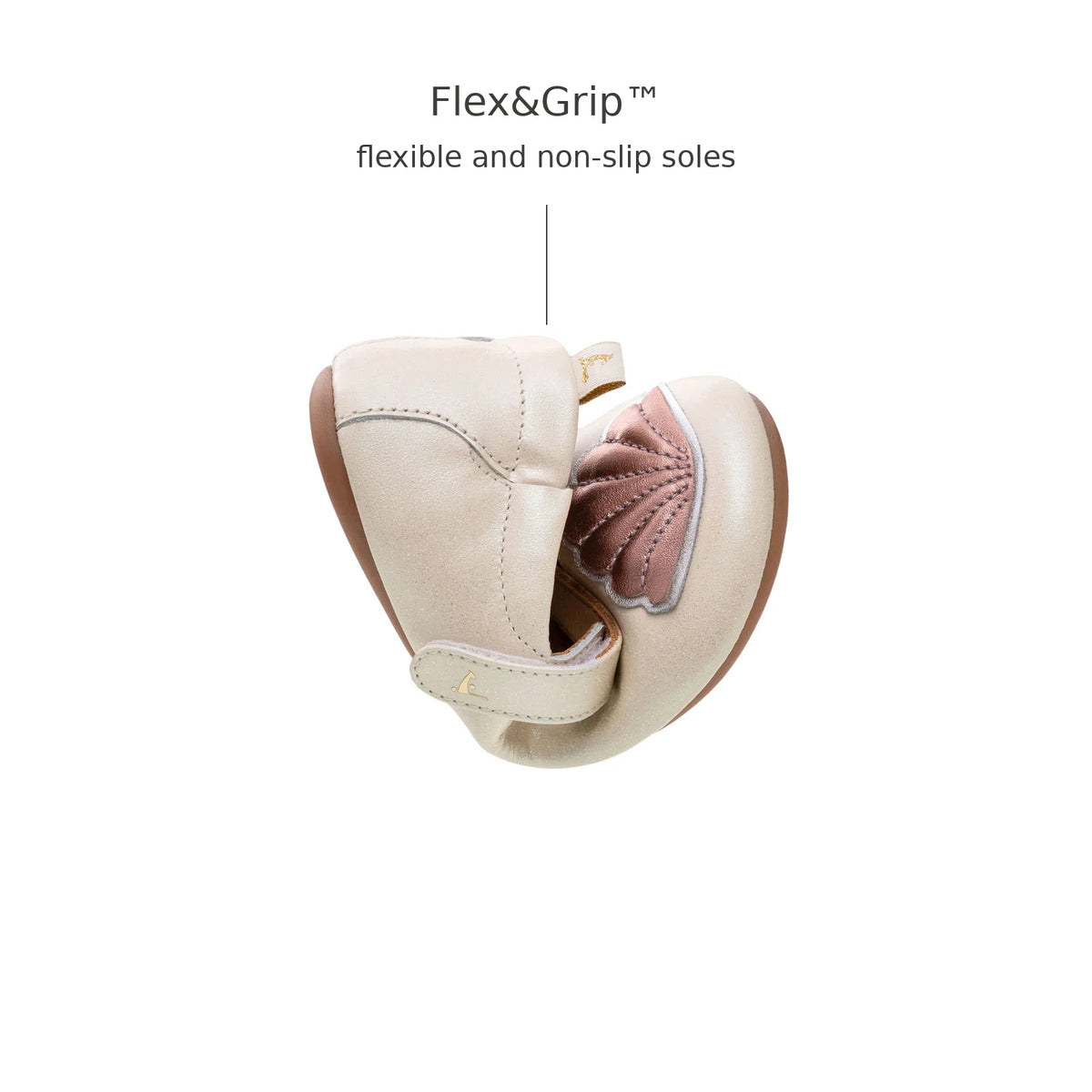 Tip Toey Joey Seashell Mary Janes in White Dream / Rose Gold / Metal Blue bending at the toe to show the flexible sole