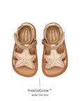 Top view of Tip Toey Joey Starfish Sandals in Metallic Salmon / Rosa Seco / Golden Sugar showing the wide FreetoGrow toe box