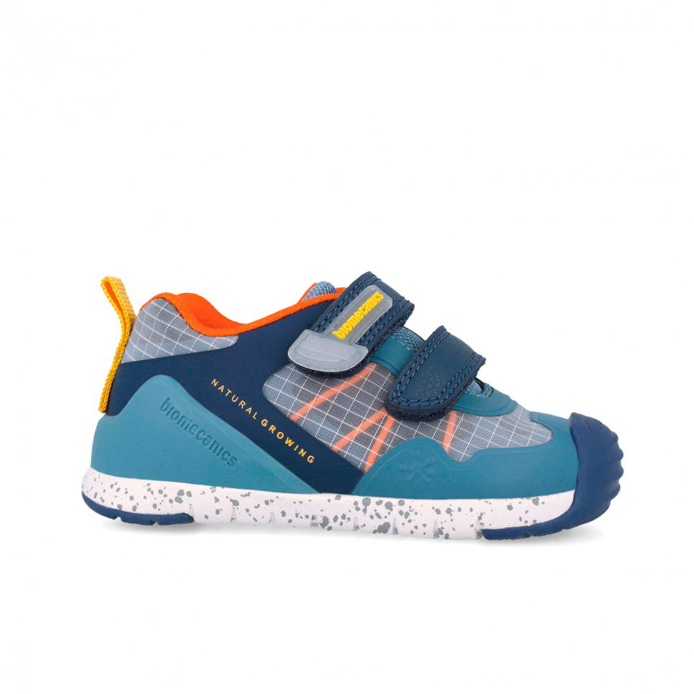 Children's shoe with blue, gray, and orange design on a white background