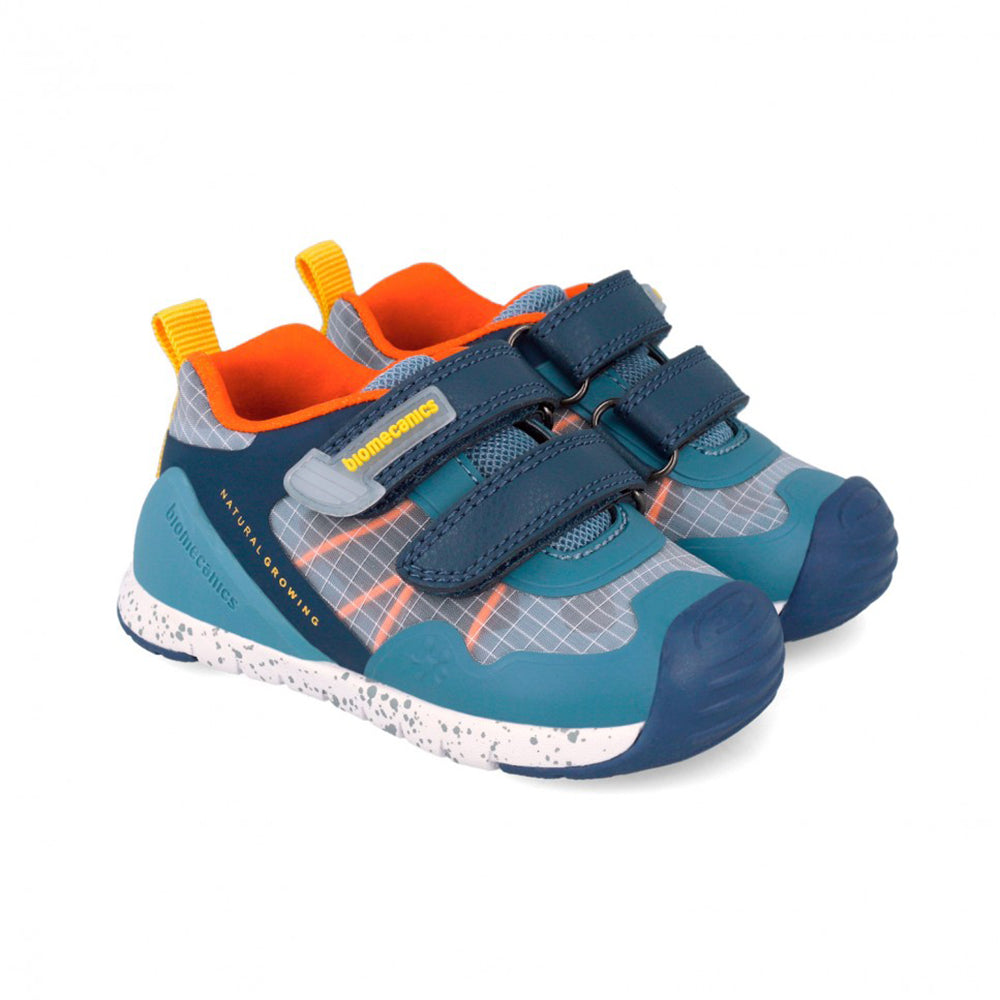 Children's shoe with blue, gray, and orange design on a white background