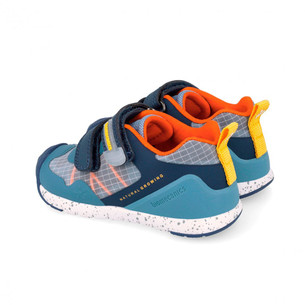 Children's shoe with blue, gray, and orange design on a white background